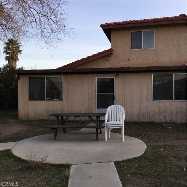 17590 El Cajon Dr, Hesperia, CA 92345 - rear view of property with a patio
