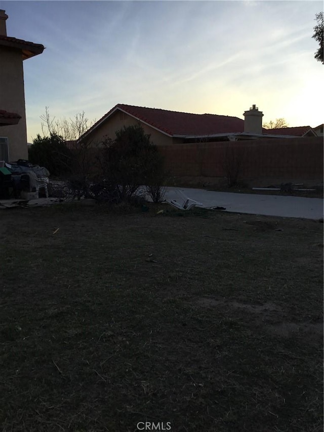 17590 El Cajon Dr, Hesperia, CA 92345 - view of yard at dusk