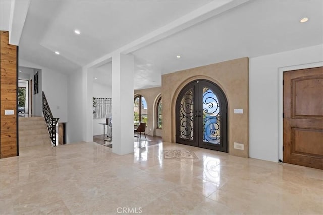 364 Via Almar, Palos Verdes Estates, CA 90274 - entryway with arched walkways, french doors, marble tiled flooring, and stairway