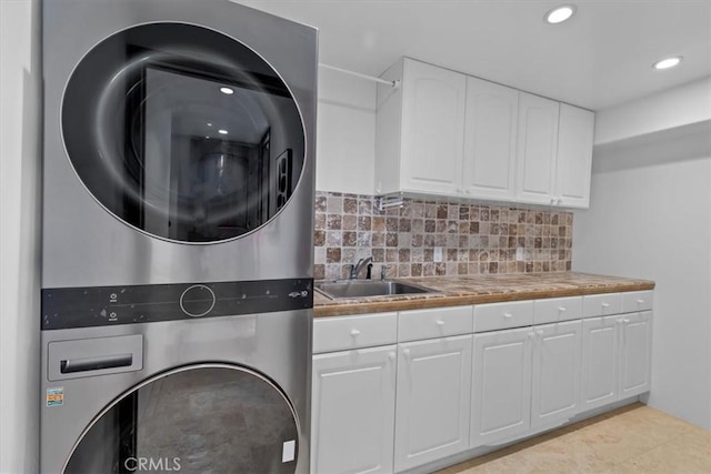 364 Via Almar, Palos Verdes Estates, CA 90274 - washroom with stacked washer and clothes dryer, a sink, and recessed lighting