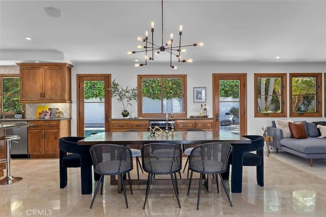 364 Via Almar, Palos Verdes Estates, CA 90274 - dining room featuring healthy amount of natural light, a chandelier, recessed lighting, and light marble finish floors