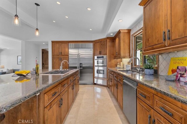 364 Via Almar, Palos Verdes Estates, CA 90274 - kitchen featuring stainless steel appliances, a sink, a warming drawer, brown cabinets, and decorative backsplash