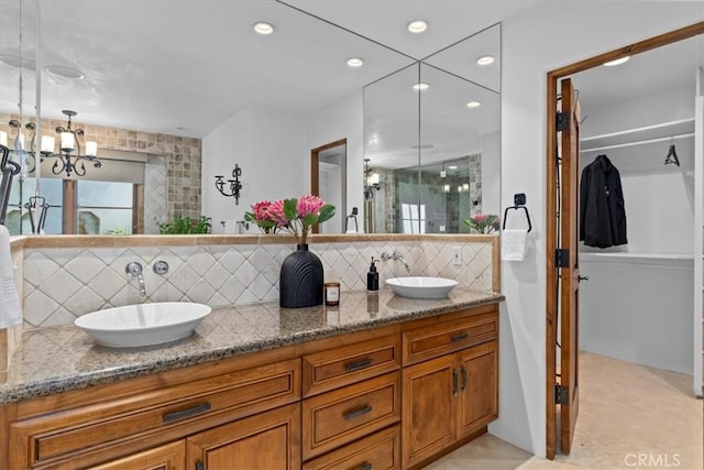 364 Via Almar, Palos Verdes Estates, CA 90274 - full bathroom featuring double vanity, tasteful backsplash, a spacious closet, recessed lighting, and a chandelier