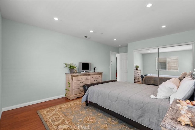 15721 Cobalt St Unit 118, Sylmar, CA 91342 - bedroom with wood finished floors, recessed lighting, and a closet
