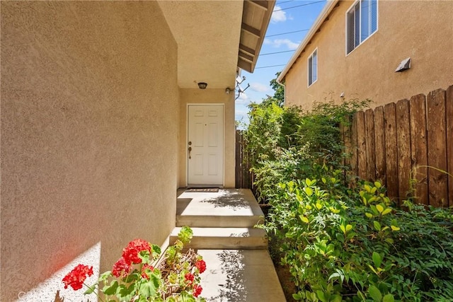 15721 Cobalt St Unit 118, Sylmar, CA 91342 - view of exterior entry featuring stucco siding