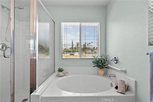 15721 Cobalt St Unit 118, Sylmar, CA 91342 - full bath featuring a garden tub and a shower stall