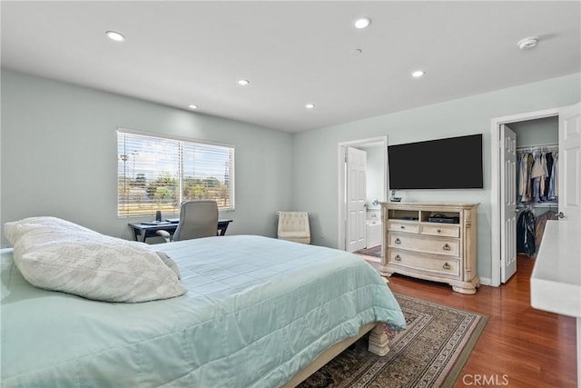 15721 Cobalt St Unit 118, Sylmar, CA 91342 - bedroom with dark wood-style floors, a walk in closet, recessed lighting, a closet, and connected bathroom