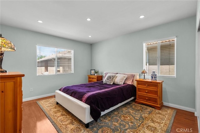 15721 Cobalt St Unit 118, Sylmar, CA 91342 - bedroom with recessed lighting and wood finished floors