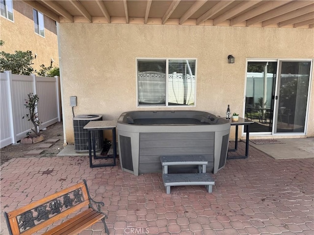 15721 Cobalt St Unit 118, Sylmar, CA 91342 - view of patio / terrace featuring a hot tub