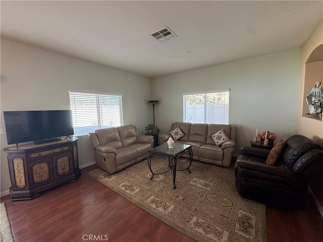 15721 Cobalt St Unit 118, Sylmar, CA 91342 - living area featuring healthy amount of natural light and wood finished floors