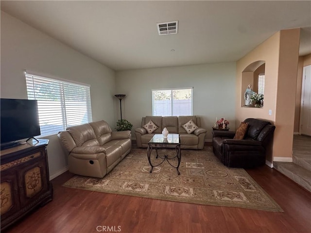 15721 Cobalt St Unit 118, Sylmar, CA 91342 - living area with wood finished floors and arched walkways