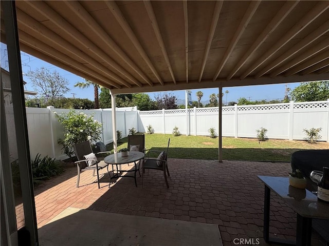 15721 Cobalt St Unit 118, Sylmar, CA 91342 - fenced backyard featuring a patio and outdoor dining space