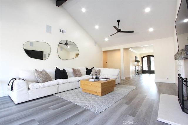 4374 Mahogany Cir, Yorba Linda, CA 92886 - living room featuring a ceiling fan, arched walkways, wood finished floors, recessed lighting, and high vaulted ceiling