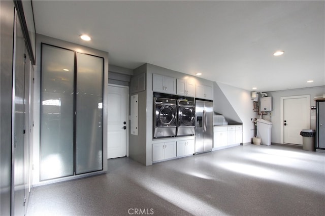 4374 Mahogany Cir, Yorba Linda, CA 92886 - garage featuring washing machine and dryer, stainless steel fridge with ice dispenser, recessed lighting, and water heater