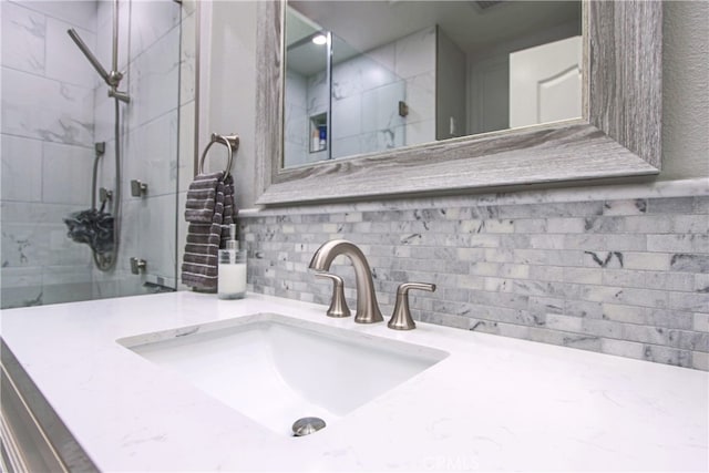 4374 Mahogany Cir, Yorba Linda, CA 92886 - bathroom featuring a tile shower, vanity, and decorative backsplash