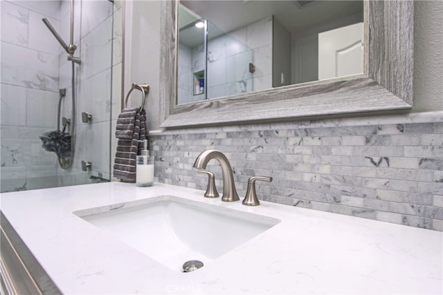 4374 Mahogany Cir, Yorba Linda, CA 92886 - bathroom with tiled shower, vanity, and backsplash
