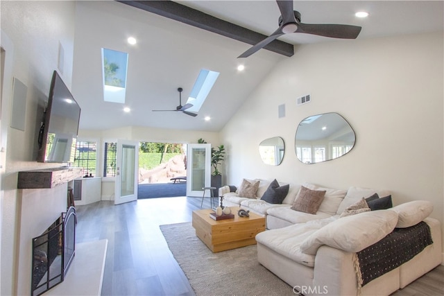4374 Mahogany Cir, Yorba Linda, CA 92886 - living area with a skylight, a ceiling fan, beam ceiling, high vaulted ceiling, and recessed lighting