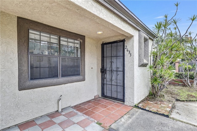 2633 Monte Carlo Unit 41, Santa Ana, CA 92706 - property entrance featuring stucco siding