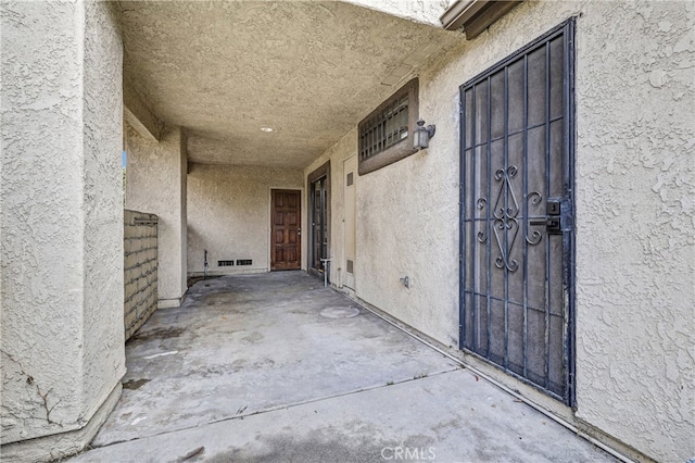 2633 Monte Carlo Unit 41, Santa Ana, CA 92706 - doorway to property with stucco siding