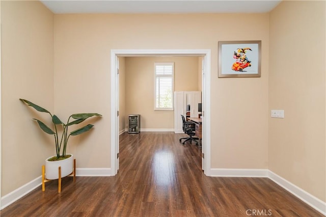 43 Lupari, Irvine, CA 92618 - corridor featuring wood finished floors, a desk, and baseboards