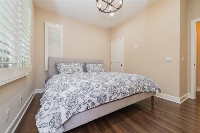 43 Lupari, Irvine, CA 92618 - bedroom with baseboards, wood finished floors, a chandelier, and multiple windows