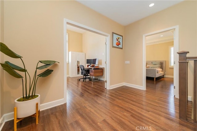 43 Lupari, Irvine, CA 92618 - hallway with wood finished floors, a desk, baseboards, and recessed lighting