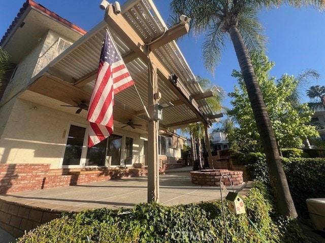 30417 Golden Gate Dr, Canyon Lake, CA 92587 - view of patio / terrace with ceiling fan and an outdoor fire pit