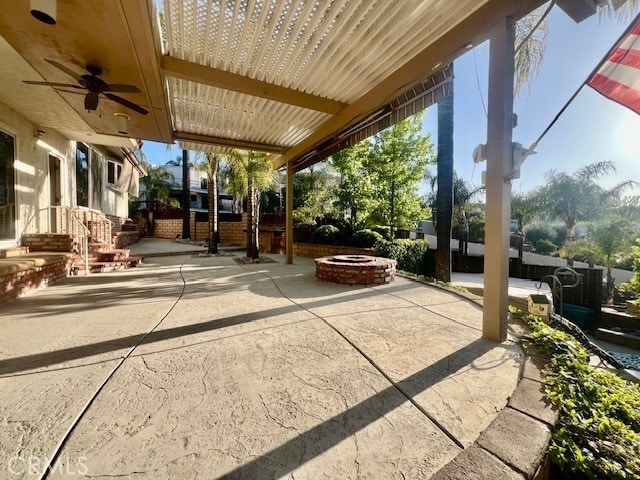 30417 Golden Gate Dr, Canyon Lake, CA 92587 - view of patio with an outdoor fire pit and a ceiling fan