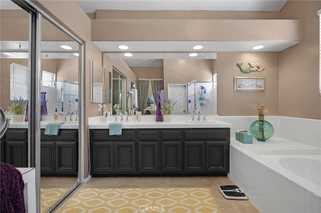 23985 Nicole Way, Yorba Linda, CA 92887 - full bath with double vanity, tile patterned floors, a garden tub, a shower with door, and recessed lighting