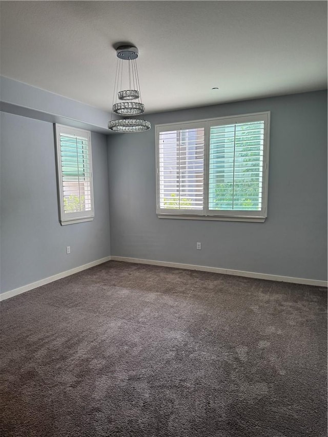 9360 Calm Water Pl, Rancho Cucamonga, CA 91730 - empty room featuring healthy amount of natural light, carpet, and baseboards