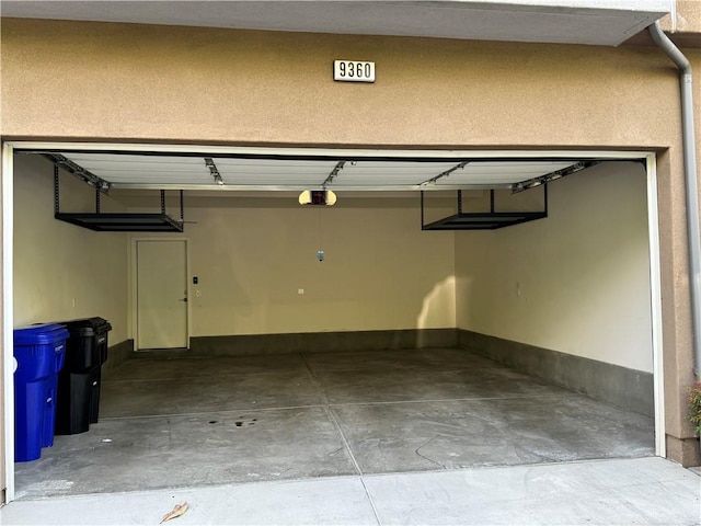 9360 Calm Water Pl, Rancho Cucamonga, CA 91730 - garage featuring a garage door opener