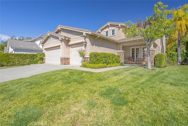 26808 Lemon Grass Way, Murrieta, CA 92562 - craftsman-style house with stone siding, an attached garage, a front lawn, french doors, and stucco siding