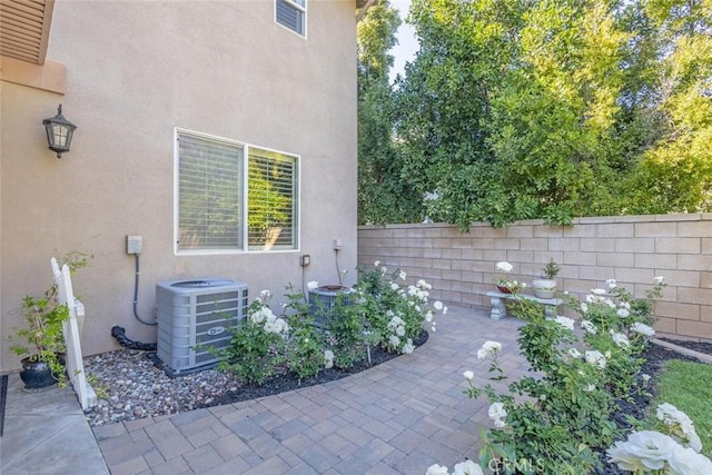 26808 Lemon Grass Way, Murrieta, CA 92562 - fenced backyard featuring central AC and a patio area