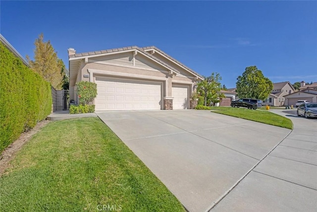 26808 Lemon Grass Way, Murrieta, CA 92562 - view of front of home with concrete driveway, an attached garage, a front yard, stone siding, and a chimney