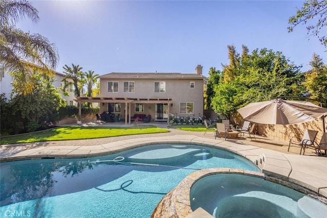 26808 Lemon Grass Way, Murrieta, CA 92562 - view of pool featuring a patio, a yard, and a pool with connected hot tub