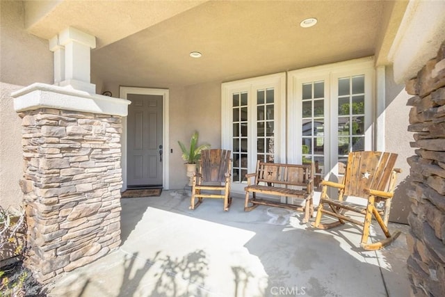 26808 Lemon Grass Way, Murrieta, CA 92562 - property entrance featuring french doors and stucco siding