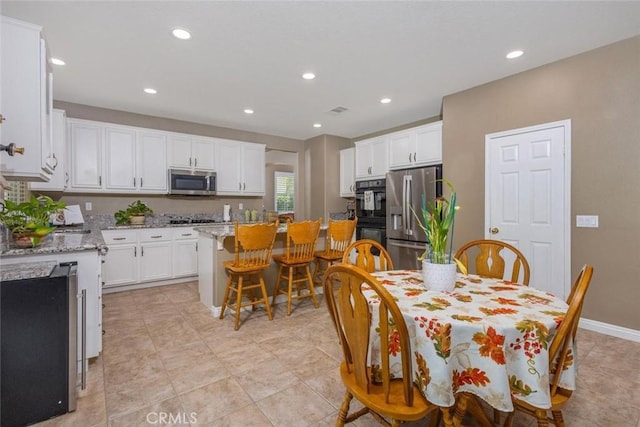 26808 Lemon Grass Way, Murrieta, CA 92562 - dining space featuring recessed lighting and baseboards