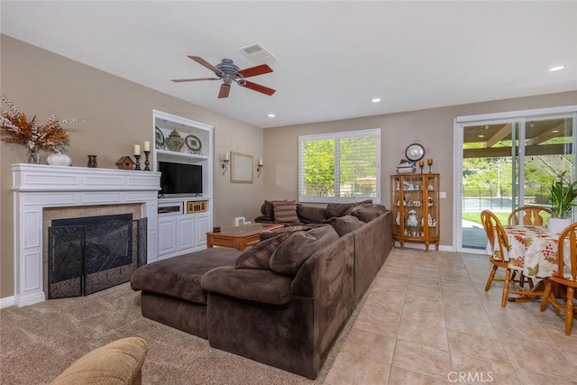 26808 Lemon Grass Way, Murrieta, CA 92562 - living room with a ceiling fan, recessed lighting, a tiled fireplace, and light tile patterned flooring