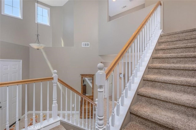 26808 Lemon Grass Way, Murrieta, CA 92562 - staircase featuring a towering ceiling