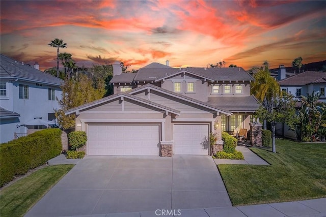 26808 Lemon Grass Way, Murrieta, CA 92562 - view of front facade with driveway, stone siding, a front yard, a garage, and a tiled roof