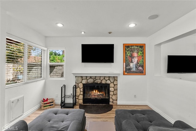 19777 Azure Field Dr, Newhall, CA 91321 - living area featuring baseboards, wood finished floors, a fireplace, and recessed lighting