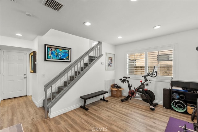 19777 Azure Field Dr, Newhall, CA 91321 - exercise room with baseboards, light wood-style flooring, and recessed lighting
