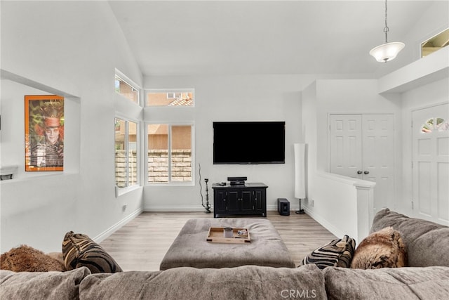 19777 Azure Field Dr, Newhall, CA 91321 - living room with plenty of natural light, light wood-type flooring, and baseboards