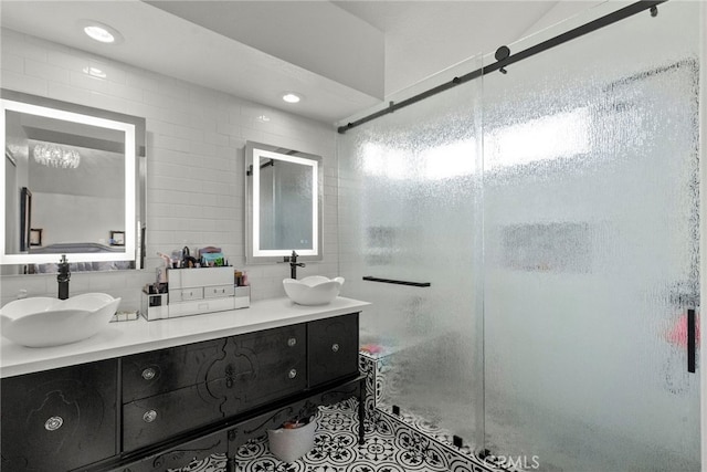 19777 Azure Field Dr, Newhall, CA 91321 - bathroom with tile walls, a shower stall, double vanity, and recessed lighting
