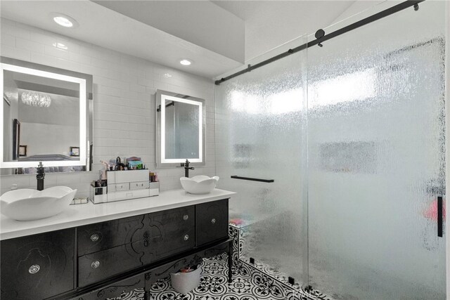 19777 Azure Field Dr, Newhall, CA 91321 - full bathroom featuring tile walls, a stall shower, double vanity, and recessed lighting