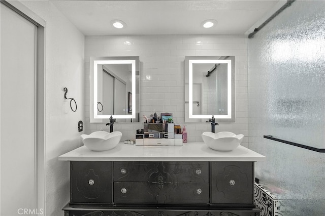 19777 Azure Field Dr, Newhall, CA 91321 - bathroom with double vanity and tile walls