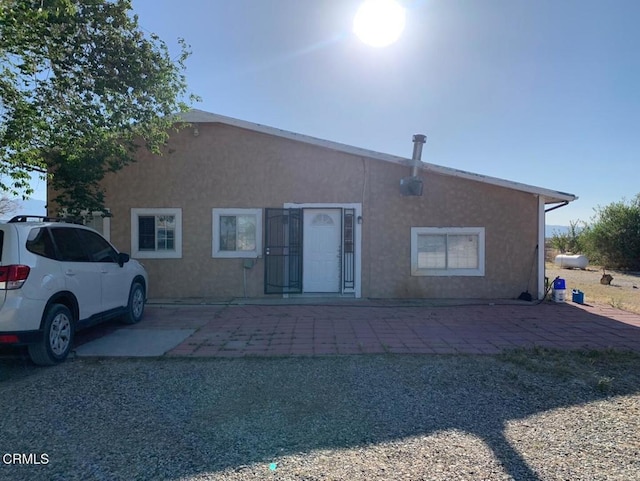 10424 Santa Fe Fire Rd, Lucerne Valley, CA 92356 - back of property featuring stucco siding