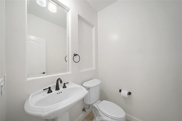 1824 Nathan Way, Nipomo, CA 93444 - bathroom with baseboards, a sink, and toilet