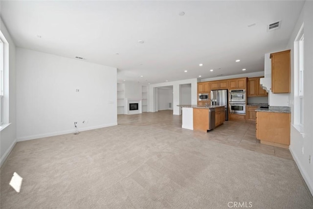 1824 Nathan Way, Nipomo, CA 93444 - kitchen with stainless steel appliances, open floor plan, recessed lighting, light carpet, and a kitchen island
