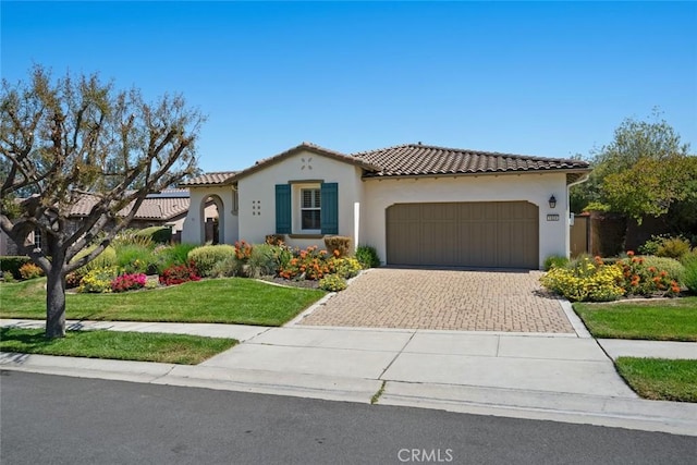 1824 Nathan Way, Nipomo, CA 93444 - mediterranean / spanish house with driveway, a garage, stucco siding, and a tile roof